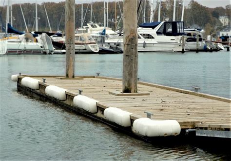 boat fenders attached to dock.